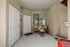 Welcoming apartment entryway with cozy seating and stylish decor, perfect for relaxation.