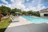 Sparkling Swimming Pool with a Sun Deck