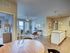 Living Room with Breakfast Bar in the Kitchen