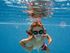 girl swimming on community pool