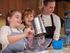 kids with mom making dough in the kitchen