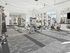 Bright, modern fitness center with state-of-the-art exercise equipment, large windows, and a spacious layout.