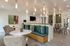 Elegant communal area with modern lighting, plush seating, and stylish decor, perfect for relaxation and social gatherings.