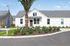 Charming white cottage-style house with a manicured garden, palm tree, and inviting front entrance under a clear blue sky.