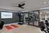 Modern gym facility at The Sinclair featuring exercise mats, free weights, and advanced fitness equipment with stylish design.