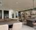 Elegant communal area with modern seating, chic decor, and artistic wall displays, perfect for relaxation and socializing.