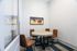Private study room with a table and four chairs