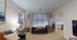 Inviting living room with cozy sofa, elegant curtains, and stylish decor showcasing a warm, modern ambiance.