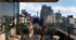 Luxurious rooftop terrace with a stunning skyline view, perfect for social gatherings and relaxing evenings.
