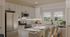 Modern kitchen featuring white shaker cabinets, stainless steel appliances, center island seating, subway tile backsplash, and abundant natural light.