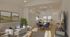 Open-concept living, dining, and kitchen area with vaulted ceiling, neutral d&eacute;cor, modern furnishings, and spacious layout.