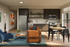 Modern open-concept living room and kitchen with sleek appliances, cozy seating, and a sunlit dining area.