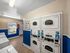 Community laundry room with washers and dryers