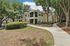 Spacious Apartment Homes with Private Balconies and Tree-Lined Walkways