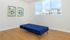 Plank-style flooring and Large windows in Bedroom | Outlook at Pilot Butte Apartments | Apartments Bend Oregon