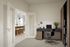 ozy den in two-bedroom layout at The Oslo, perfect for a home office or relaxation space, complemented by tasteful decor and functional design.
