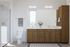 Spacious primary bathroom in The Oslo&rsquo;s two-bedroom den unit, featuring modern fixtures, a large vanity with ample storage, and a luxuriously large shower to create a serene, spa-like atmosphere.