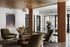 Elegant lobby area of Leawood Village featuring modern furniture, decorative lighting, and a welcoming atmosphere for residents and guests.
