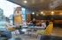 Inviting modern lounge area with stylish furniture, cozy seating, and ambient lighting, perfect for relaxation and socializing.