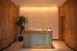 Elegant reception area with warm wooden accents and modern desk in a serene, welcoming space.