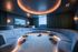 Luxurious modern lounge with circular seating, ambient lighting, and sleek decor.