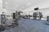 Spacious and modern fitness center with top-of-the-line exercise equipment and mirrored walls for an enhanced workout experience.