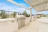 Outdoor lounge and grilling area at rental home community in Denton TX near Rayzor Ranch