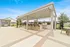 Outdoor lounge and grilling area at rental home community in Denton TX near Rayzor Ranch