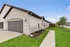 Exterior of modern single-family rental home in Denton TX with attached garage near Denton Square