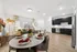 Dining area and kitchen in Denton TX rental home with modern finishes near University of North Texas