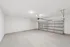 Attached two-car garage interior at single-family rental home in Denton TX near University of North Texas