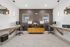 Chic home office with dual workstations, modern decor, and elegant lighting.