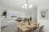Bright and airy open-plan living room with elegant dining area, modern kitchen, and large windows offering scenic views.