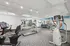 Bright and modern fitness center featuring state-of-the-art cardio and strength training equipment, ideal for a healthy lifestyle.