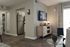 Bright and stylish apartment living space with modern decor and a well-equipped kitchen.