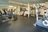 Bright and spacious gym featuring modern treadmills and exercise bikes.
