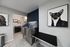 Modern pet grooming room with sleek tiled floors, a professional grooming tub, and stylish dog artwork.