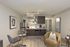 Chic apartment kitchenette with modern cabinetry, sleek appliances, and cozy seating area for a stylish living experience.