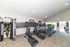 Bright and inviting fitness center featuring modern exercise equipment and natural light.