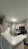 Chic modern kitchen with sleek countertops, stylish cabinetry, and a contemporary layout.