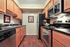 Kitchen | Deerfield Apartments in Sappington, MO