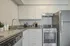 furnished kitchen area in apartment home