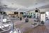 Bright and modern fitness center equipped with state-of-the-art machines, ensuring an invigorating workout experience.