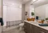 Modern bathroom oasis with sleek cabinetry, elegant vanity, and stylish decor accents.