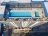 Breathtaking aerial view of a modern rooftop pool and lounge area, offering luxurious relaxation and stunning cityscape vistas.