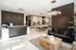 Elegant apartment lobby featuring a stylish reception desk, cozy seating area, and modern lighting, perfect for welcoming guests.