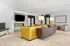 Chic and modern lobby with stylish furniture, sleek fireplace, and contemporary decor, perfect for relaxation and welcoming guests.