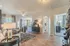 Bright and inviting open-concept living area featuring stylish decor, elegant furnishings, and a cozy ambiance perfect for relaxation.