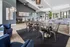 Elegant and spacious open-plan living area with modern dining setup, luxurious seating, and ample natural light.