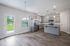 unfurnished living and kitchen area of home